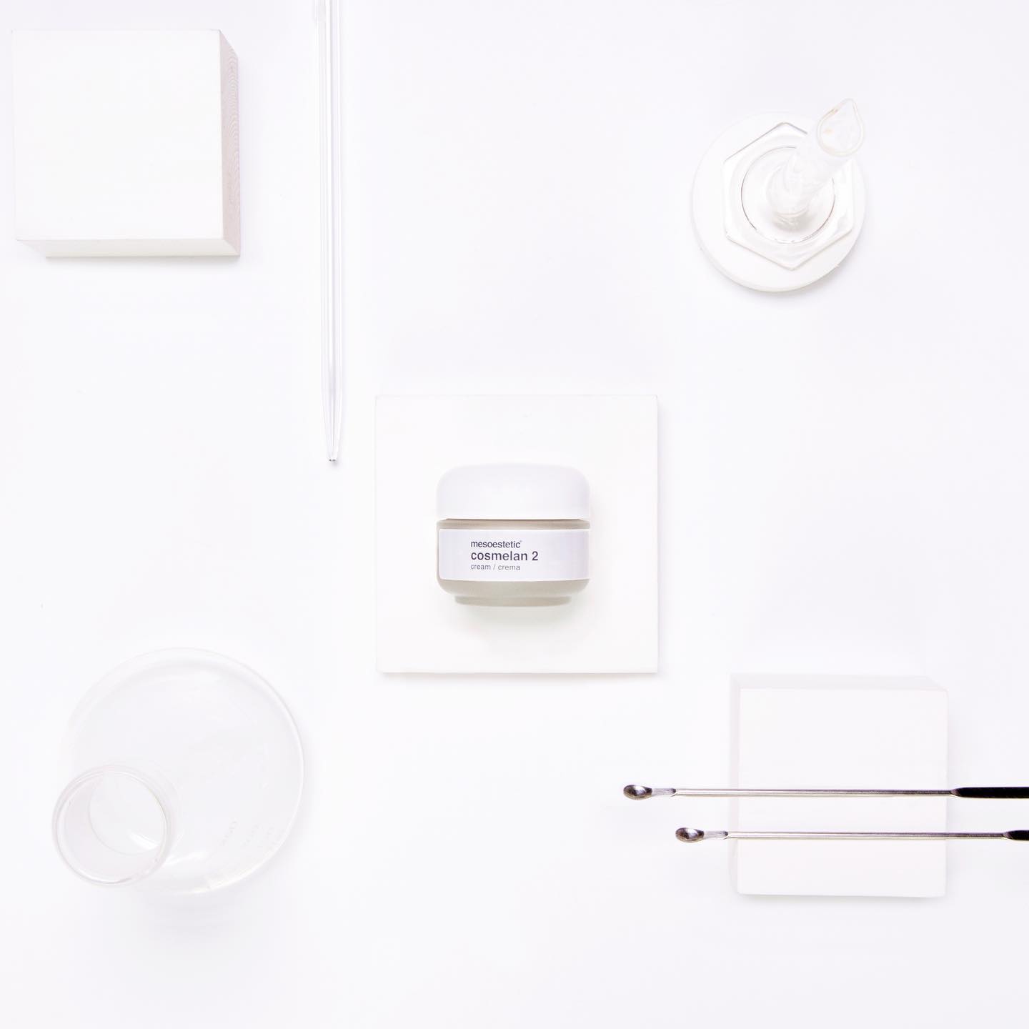 cosmelan 2 flatlay with skincare tools